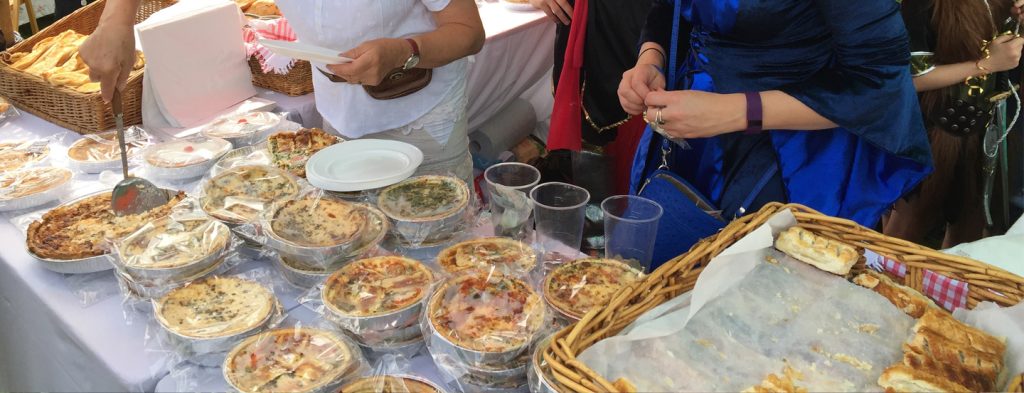 lots of quiches and sausage rolls