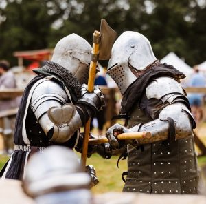2 knights in armour locked in battle
