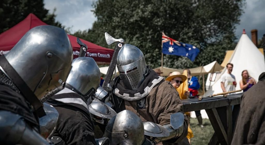 close up of knights in armour fighting